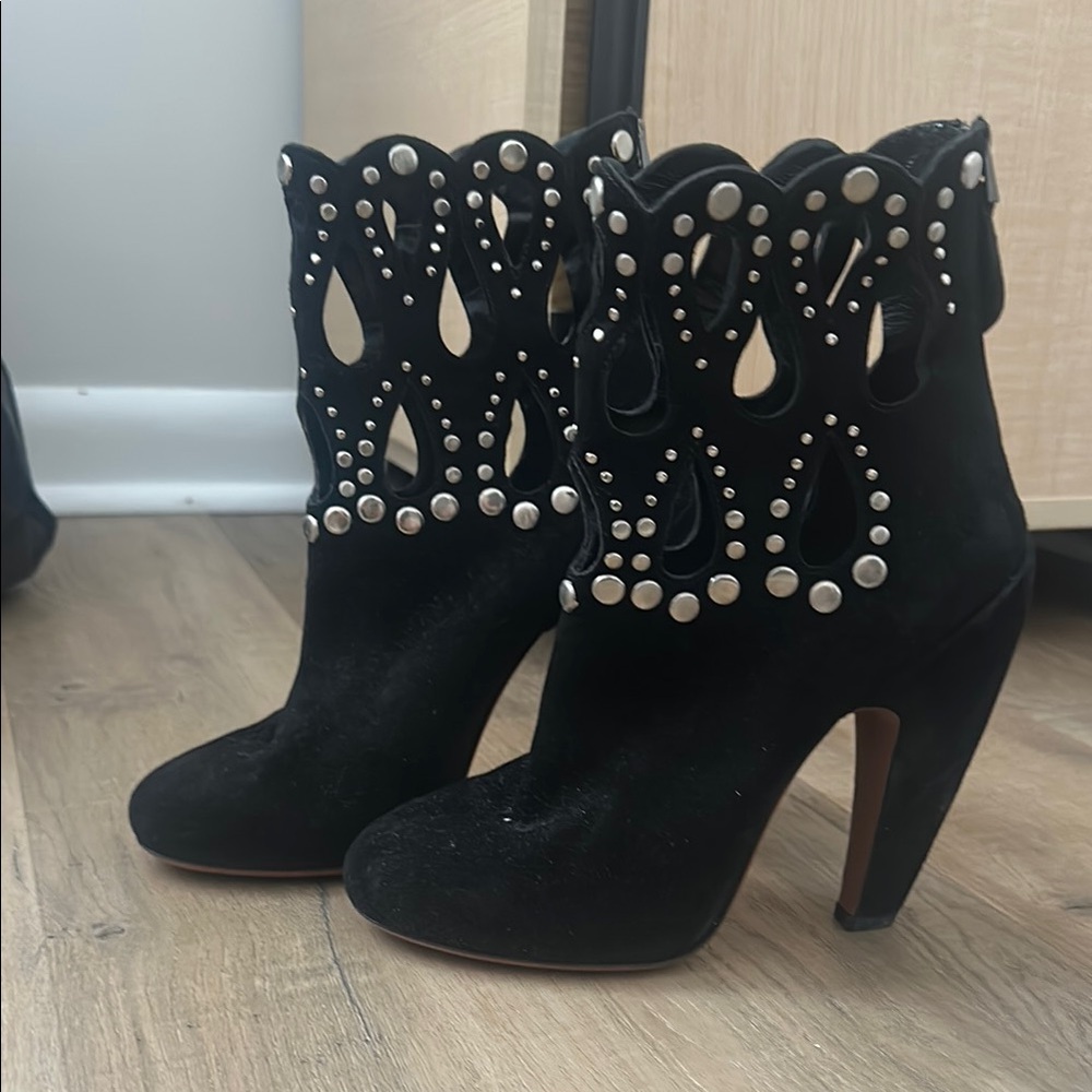 Alaia Black Heeled Boots with Laser-Cut Design